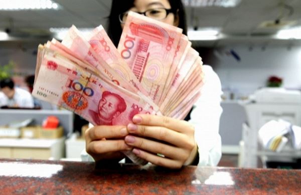 <br />
Центробанк Китая повысил курс юаня к доллару до максимума за три месяца<br />
